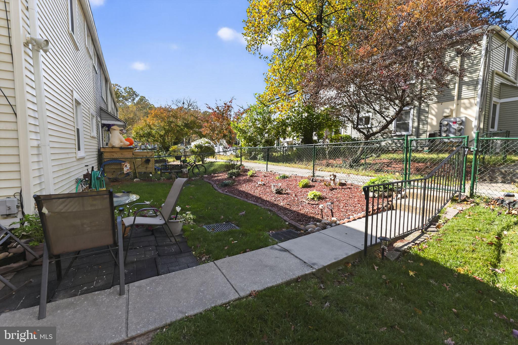 20 Hillside Road Greenbelt, MD 20770 - Photo 4 of 22 a view of a park with seating area