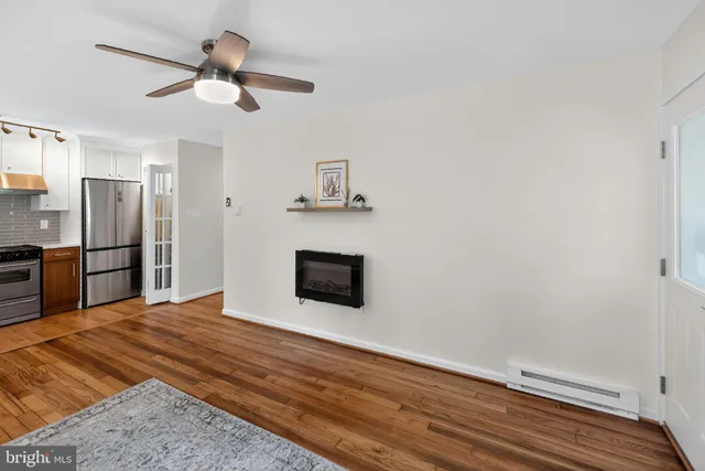 a view of a livingroom with a flat screen tv