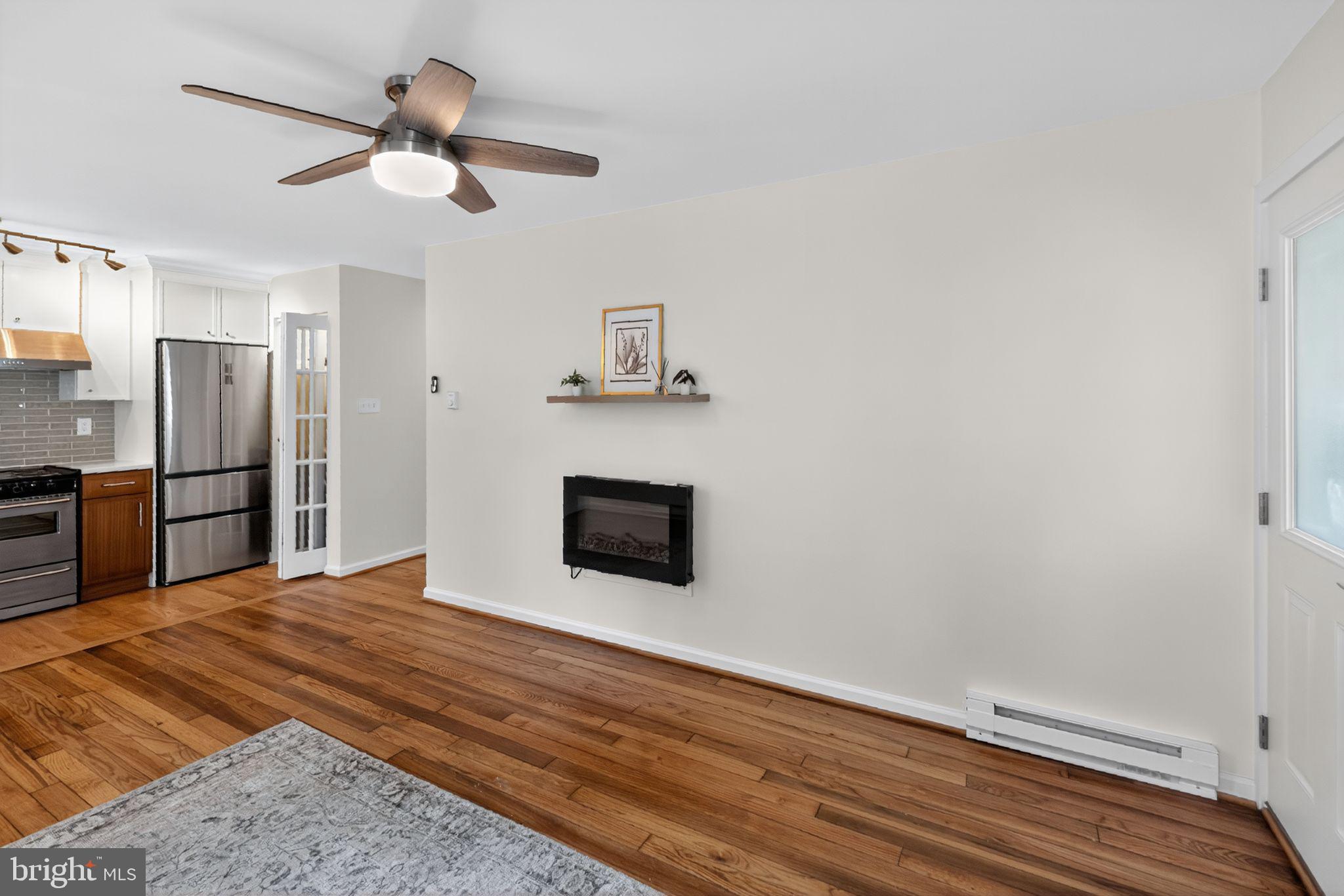 20 Hillside Road Greenbelt, MD 20770 - Photo 6 of 22 a view of a livingroom with a flat screen tv