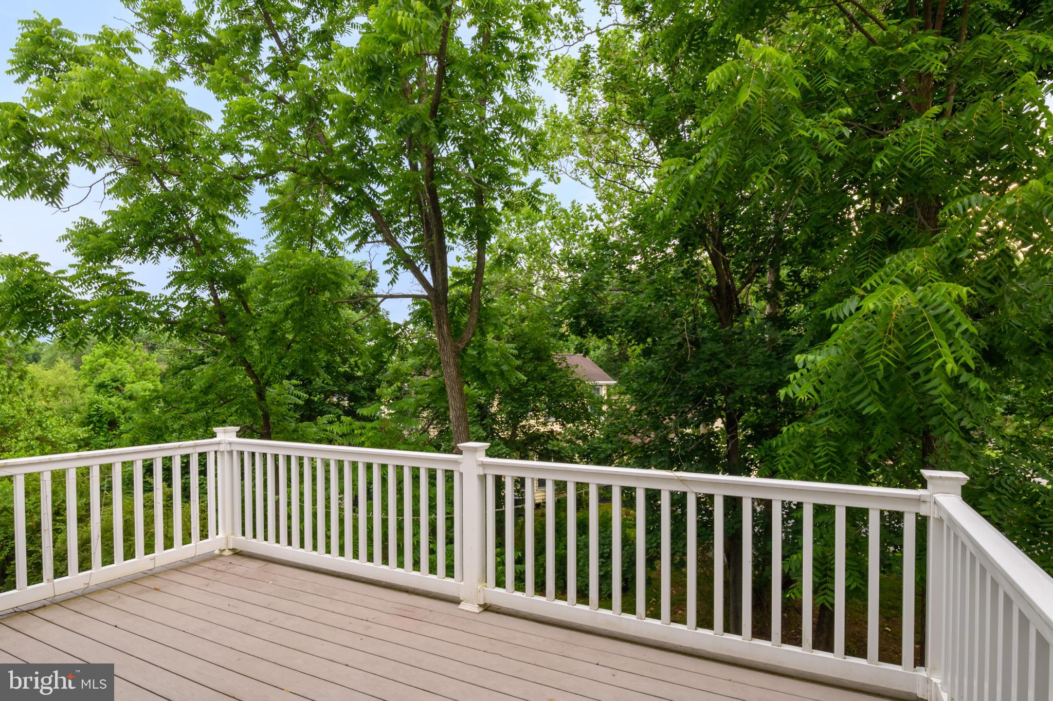 33 Greensborough Road Reisterstown, MD 21136 - Photo 13 of 40 a balcony with wooden floor and fence