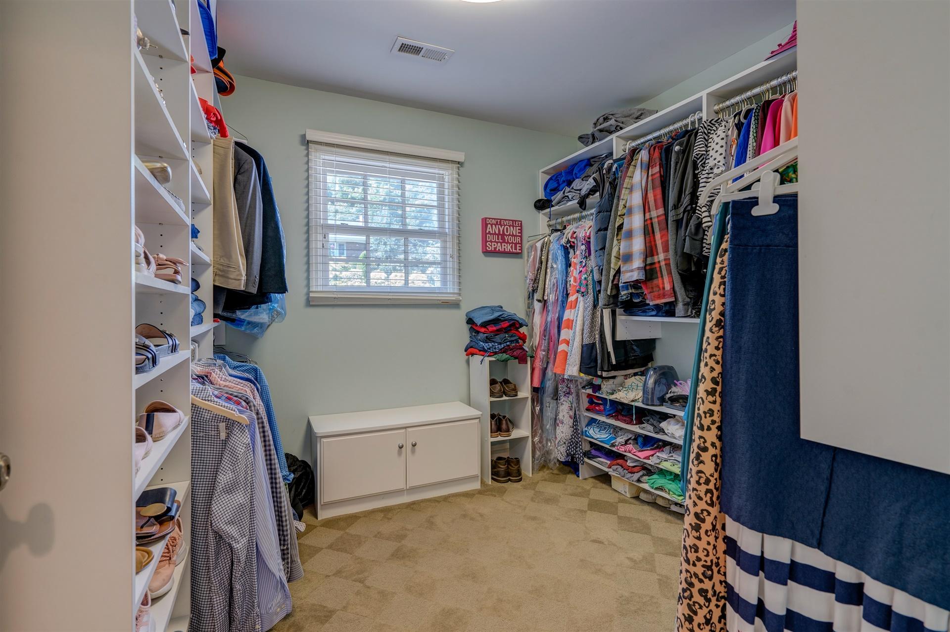 3009 Burnleigh Road Southwest Roanoke, VA 24014 - Photo 40 of 59 a view of walk in closet with clothes and shoes