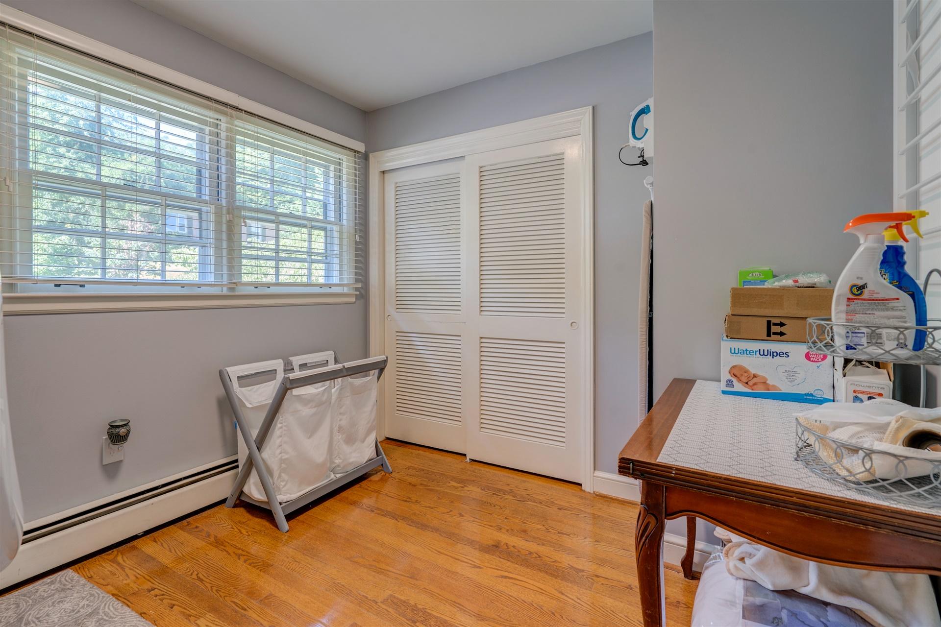 3009 Burnleigh Road Southwest Roanoke, VA 24014 - Photo 49 of 59 a view of a workspace with furniture and a window
