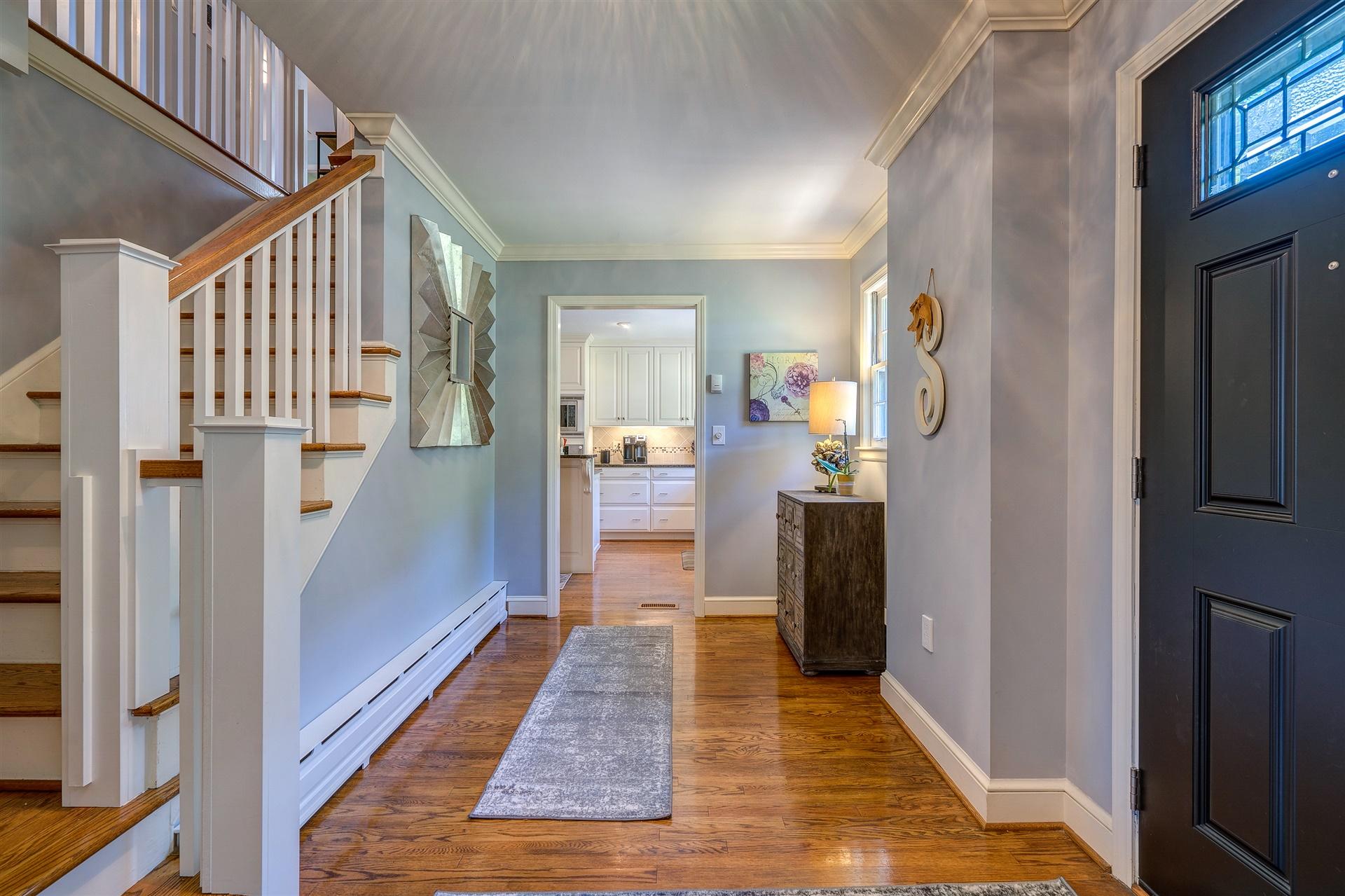 3009 Burnleigh Road Southwest Roanoke, VA 24014 - Photo 6 of 59 a view of hallway with wooden floor and stairs