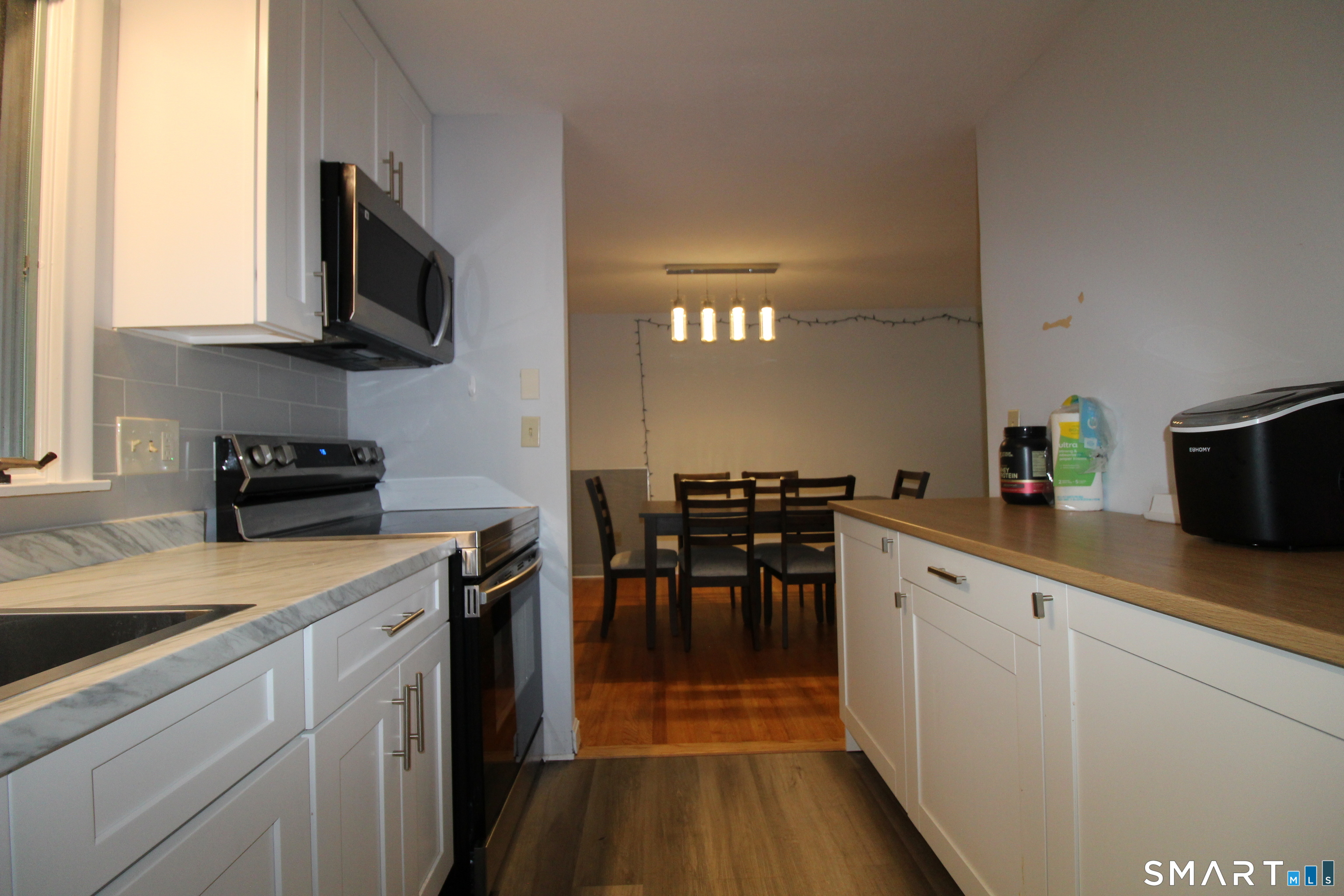 194 Cedar Swamp Road Mansfield, CT 06268 - Photo 10 of 28 Looking into dining room