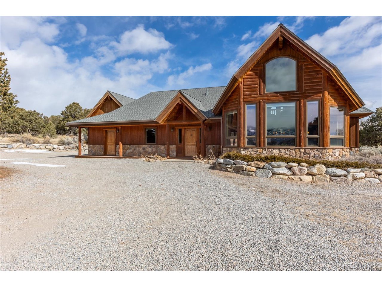 11677 Saddle Ridge Court Salida, CO 81201 - Photo 1 of 45 a view of a house with a yard