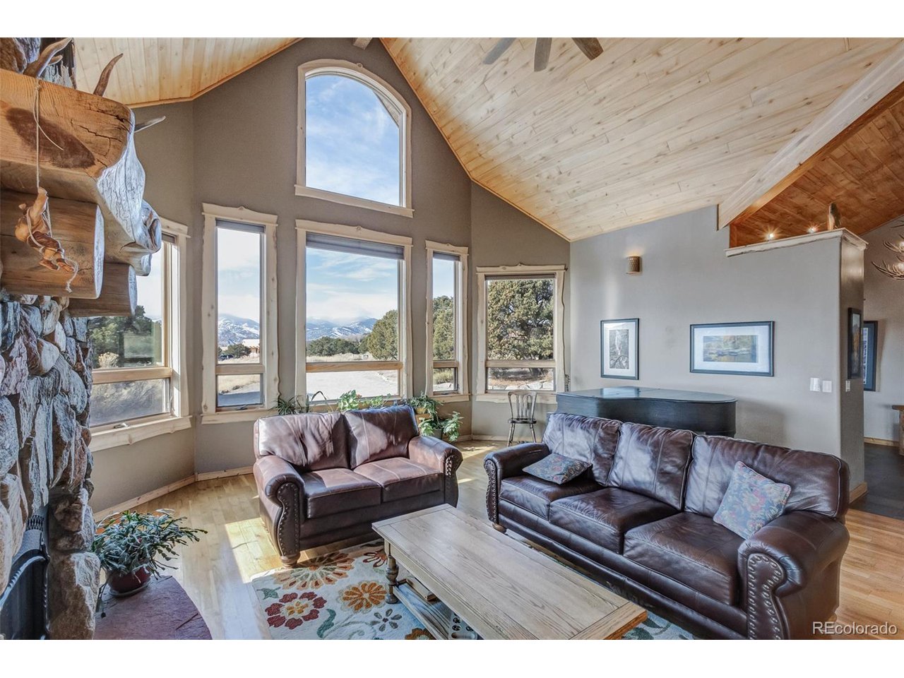 11677 Saddle Ridge Court Salida, CO 81201 - Photo 11 of 45 a living room with furniture and a large window