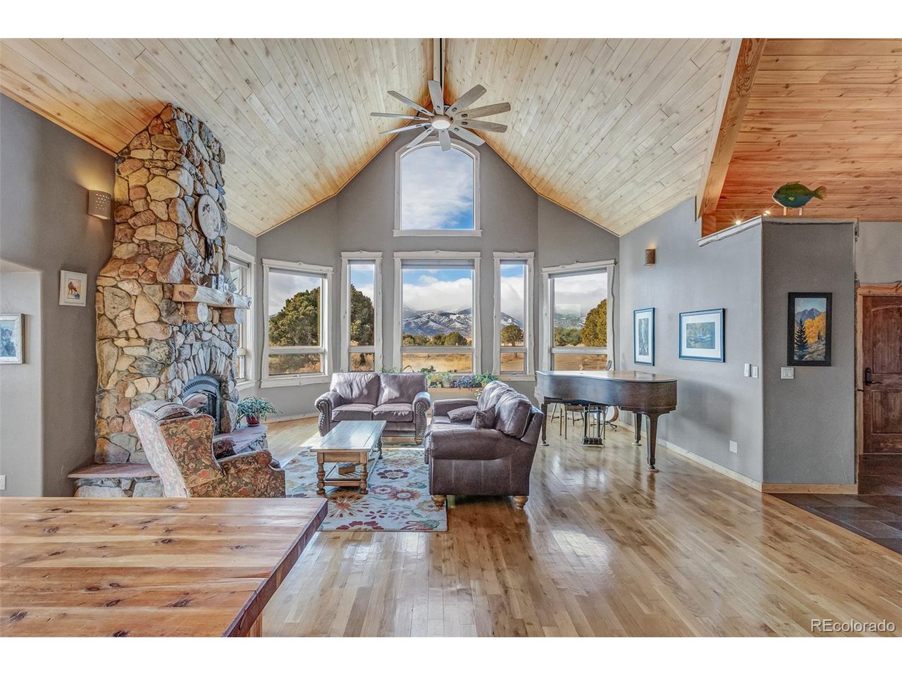 11677 Saddle Ridge Court Salida, CO 81201 - Photo 19 of 45 a living room with furniture and a wooden floor