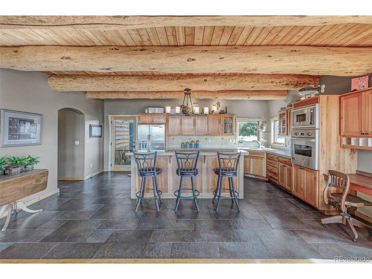 11677 Saddle Ridge Court Salida, CO 81201 - Photo 23 of 45 a dining room with furniture and window
