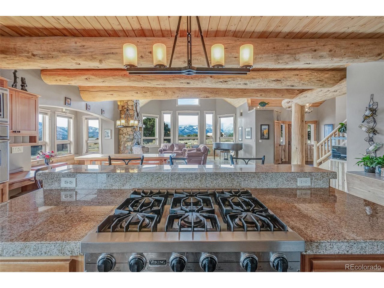 11677 Saddle Ridge Court Salida, CO 81201 - Photo 26 of 45 a view of a living room and kitchen area