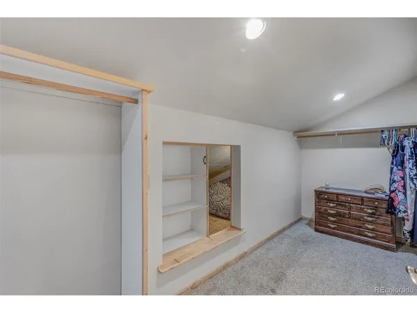 a view of room with furniture