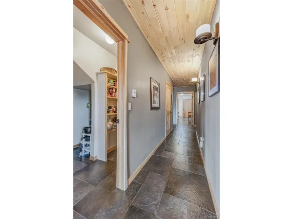 a view of a hallway with windows