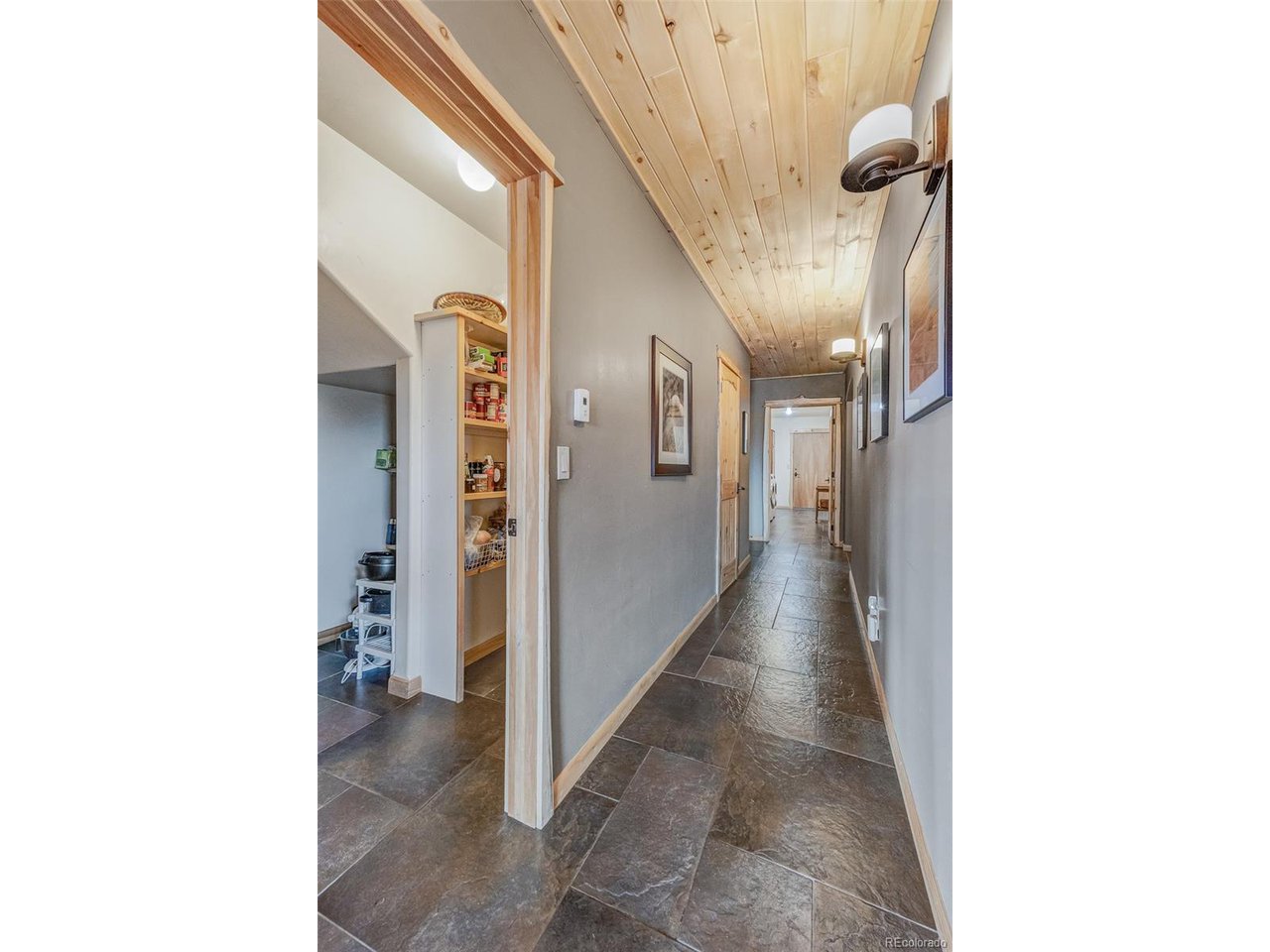 11677 Saddle Ridge Court Salida, CO 81201 - Photo 37 of 45 a view of a hallway with windows