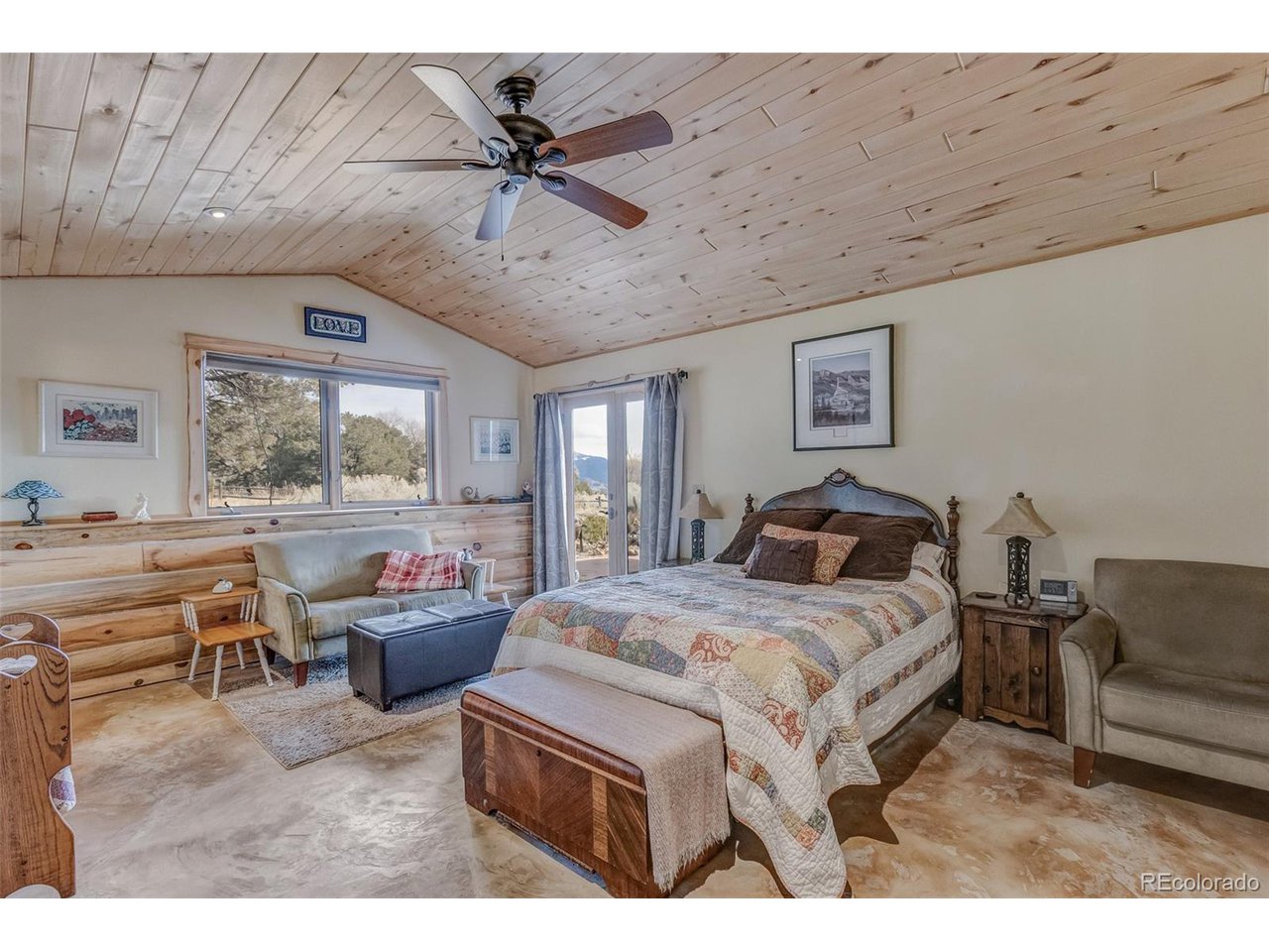 11677 Saddle Ridge Court Salida, CO 81201 - Photo 39 of 45 a living room with furniture and a large window