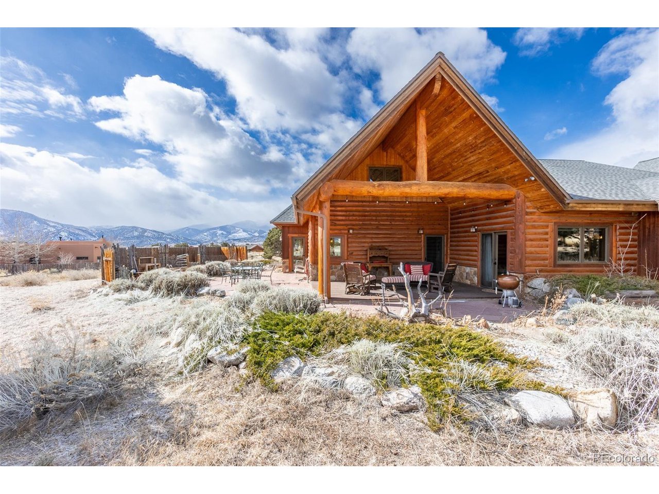 11677 Saddle Ridge Court Salida, CO 81201 - Photo 4 of 45 a view of a house with backyard porch and sitting area