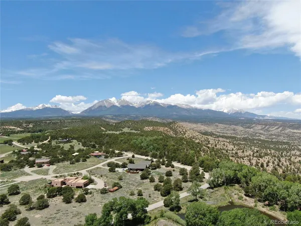 a view of a city with mountains in the background