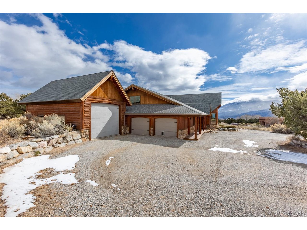 11677 Saddle Ridge Court Salida, CO 81201 - Photo 8 of 45 a front view of a house with a yard