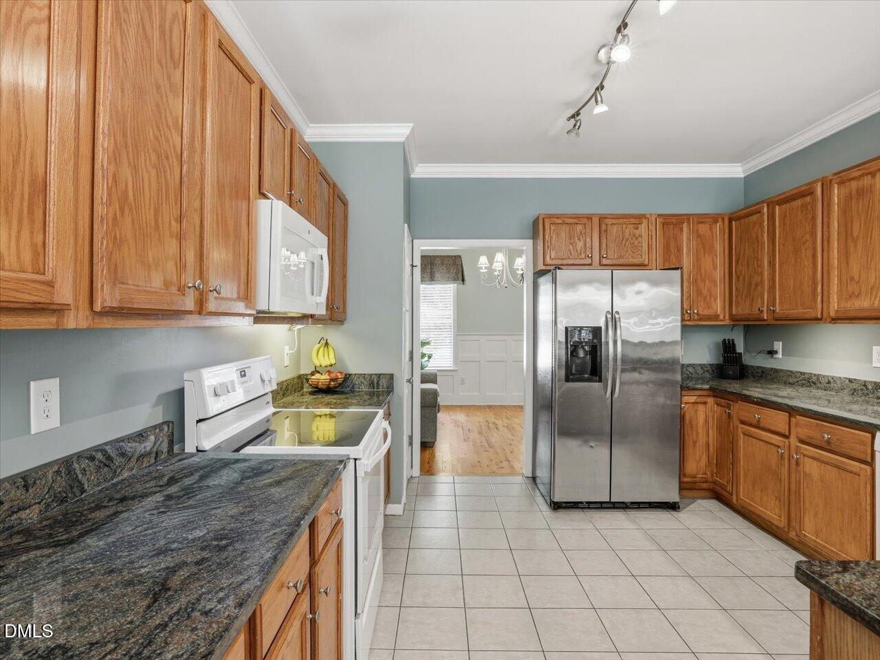 3317 Neuse Crossing Drive Raleigh, NC 27616 - Photo 9 of 36 Tons of counter space! Newer Granite countertops.