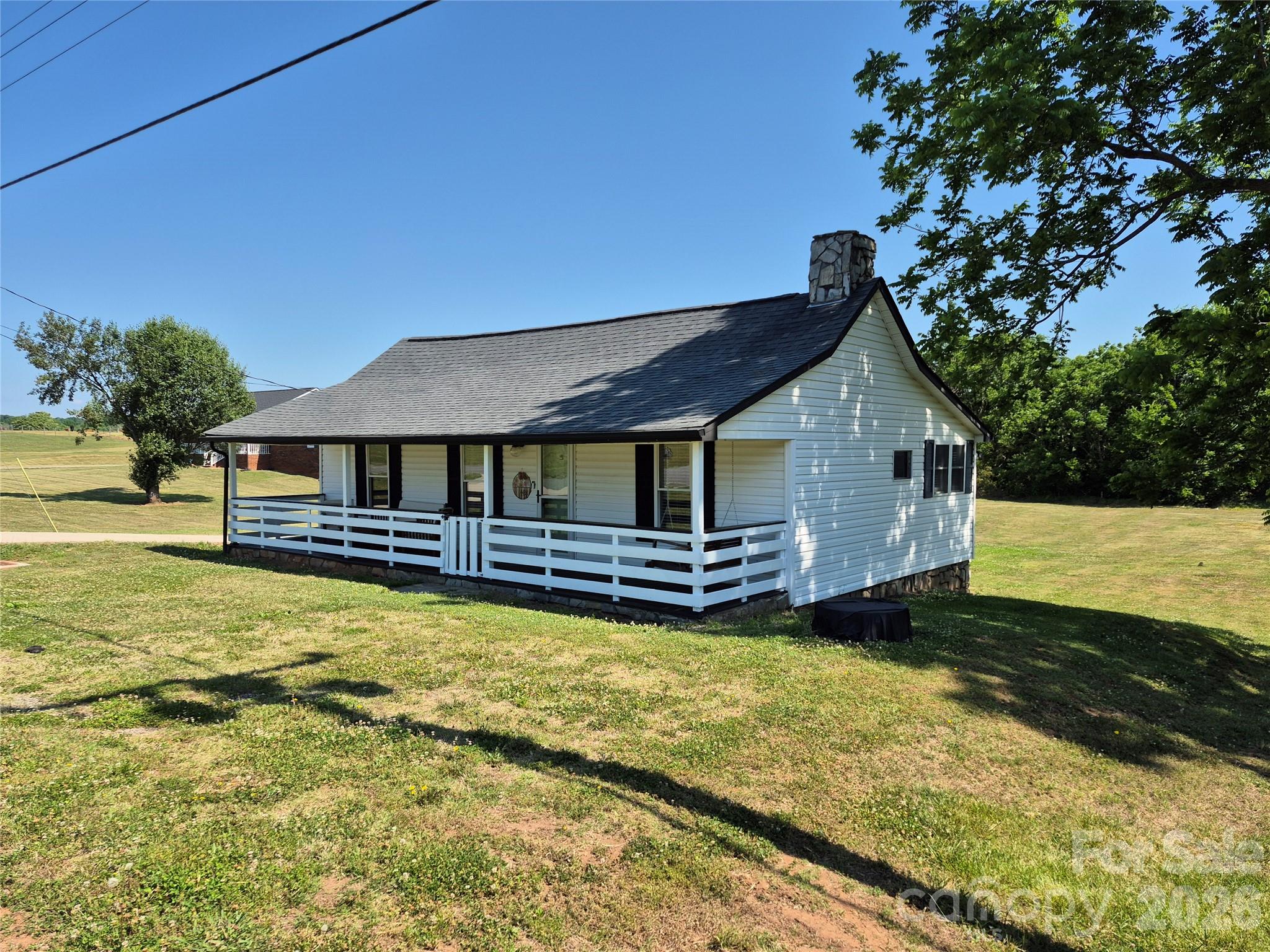 4438 Reepsville Road Vale, NC 28168 - Photo 3 of 32 a front view of a house with a yard