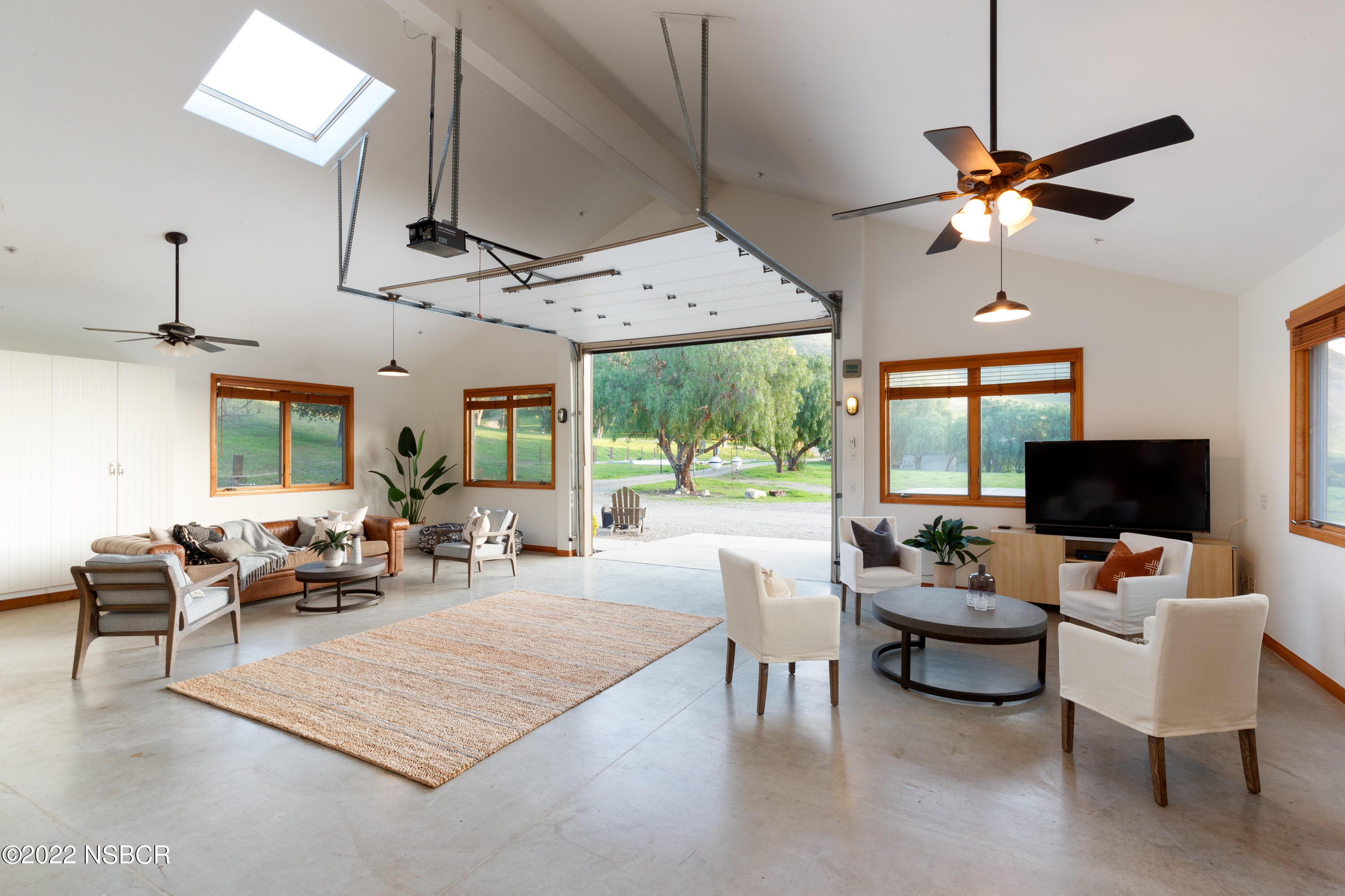 119 Hollister Ranch Road Goleta, CA 93117 - Photo 25 of 41 a living room with furniture ceiling fan and a window