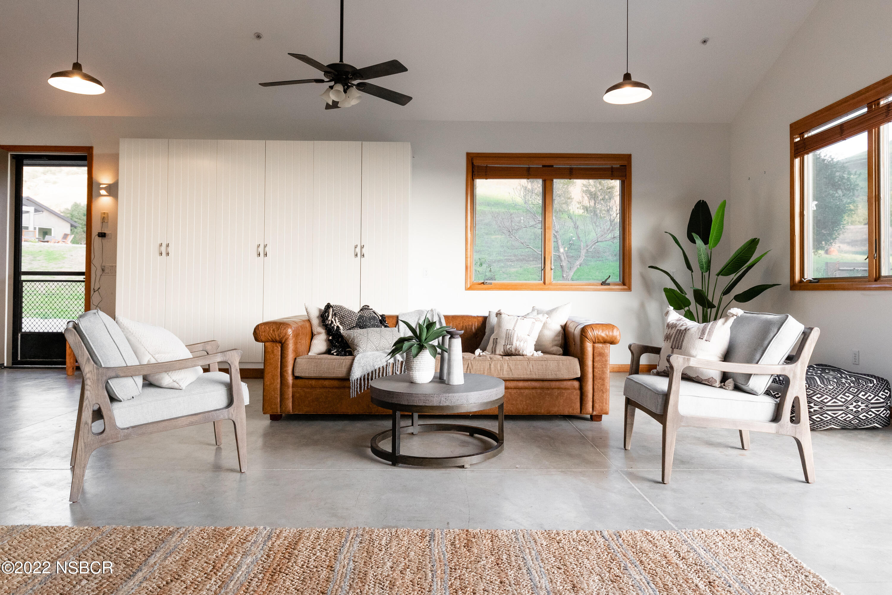 119 Hollister Ranch Road Goleta, CA 93117 - Photo 26 of 41 a living room with furniture and a large window