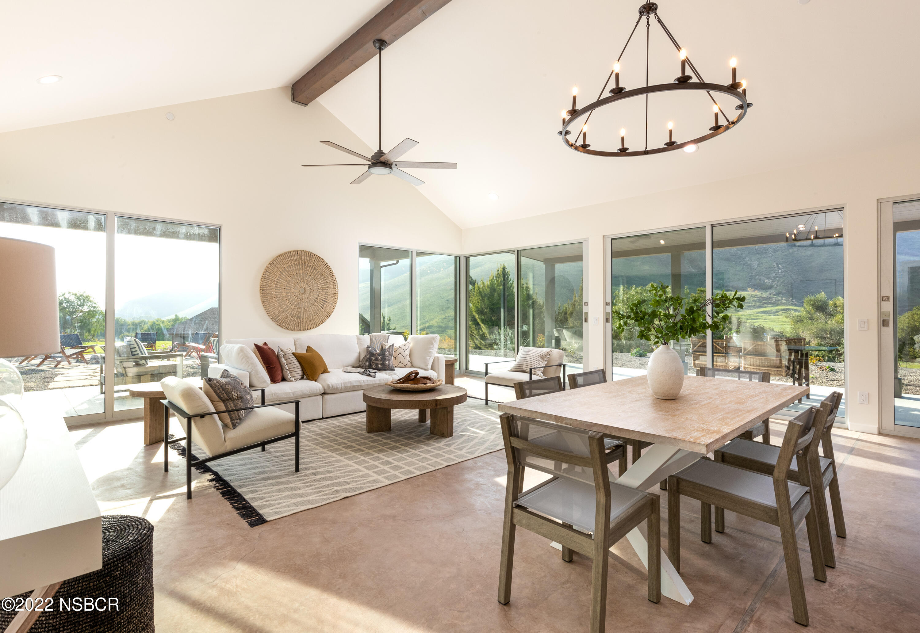 119 Hollister Ranch Road Goleta, CA 93117 - Photo 3 of 41 a living room with furniture a large window and a table