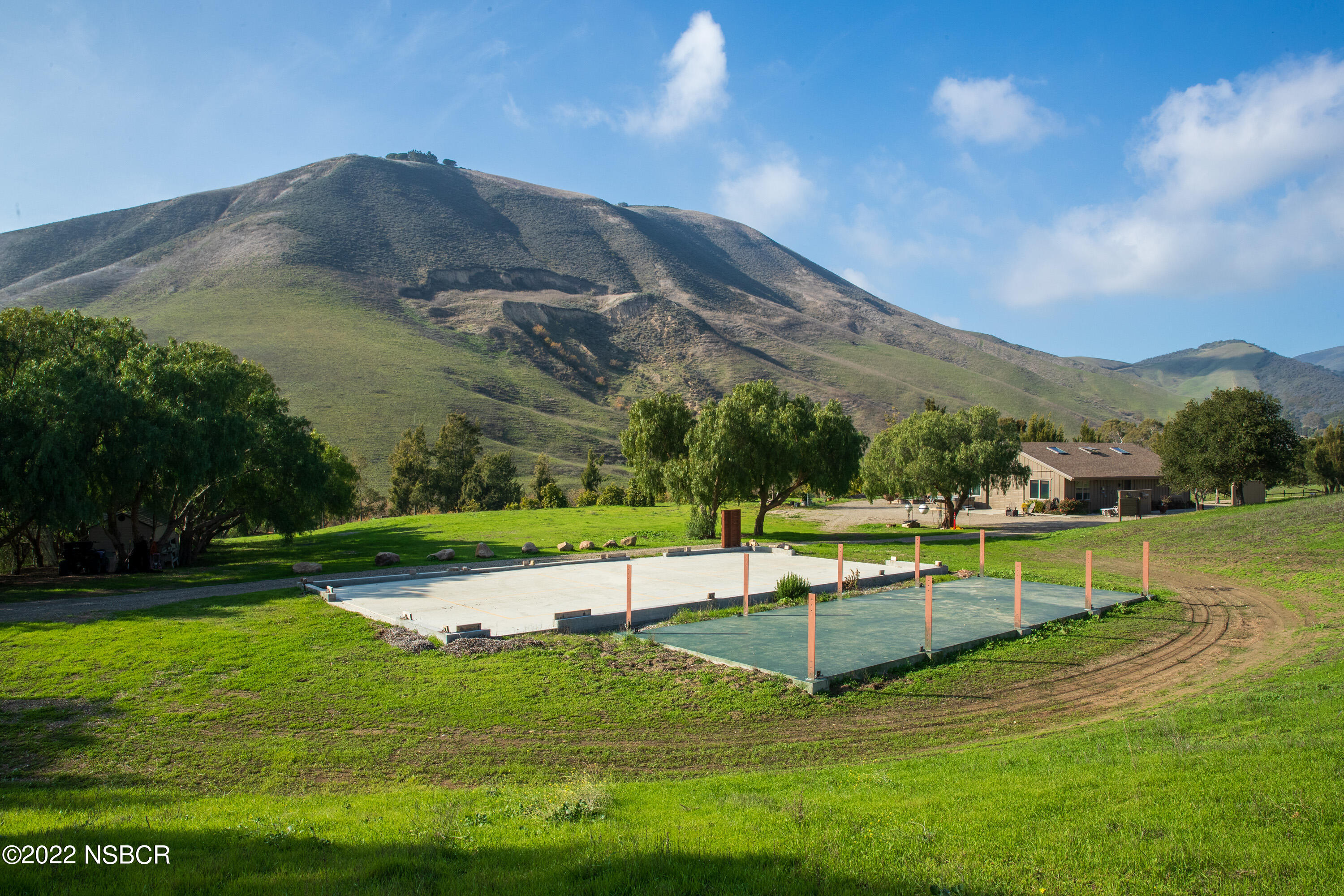 119 Hollister Ranch Road Goleta, CA 93117 - Photo 34 of 41 a view of a lake with a mountain in the background