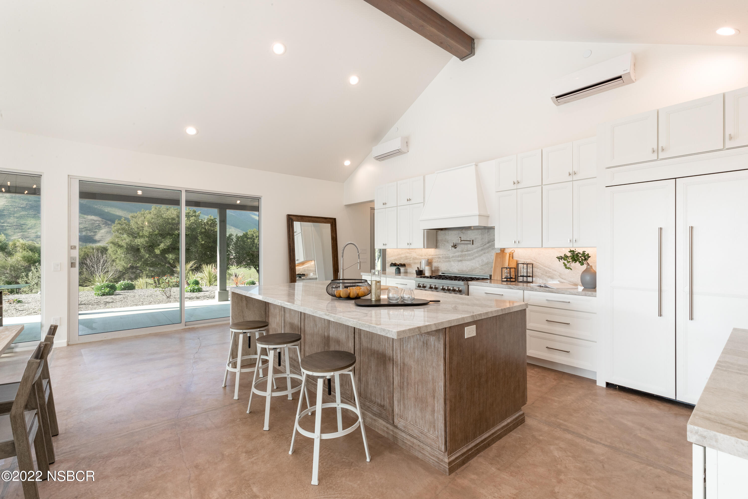 119 Hollister Ranch Road Goleta, CA 93117 - Photo 8 of 41 a kitchen with stainless steel appliances kitchen island granite countertop a sink and cabinets