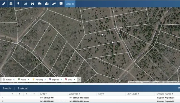 a black and white photo of a field