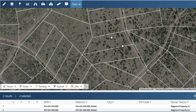 a black and white photo of a field