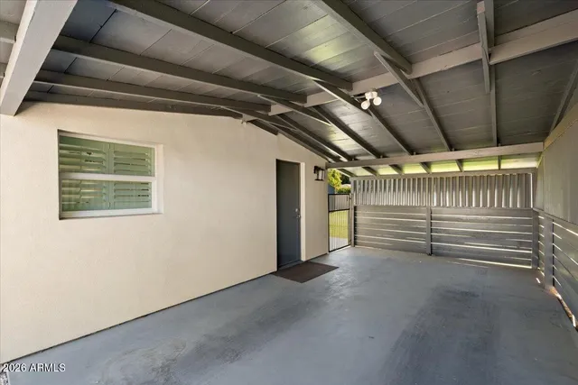 a view of empty room with stairs