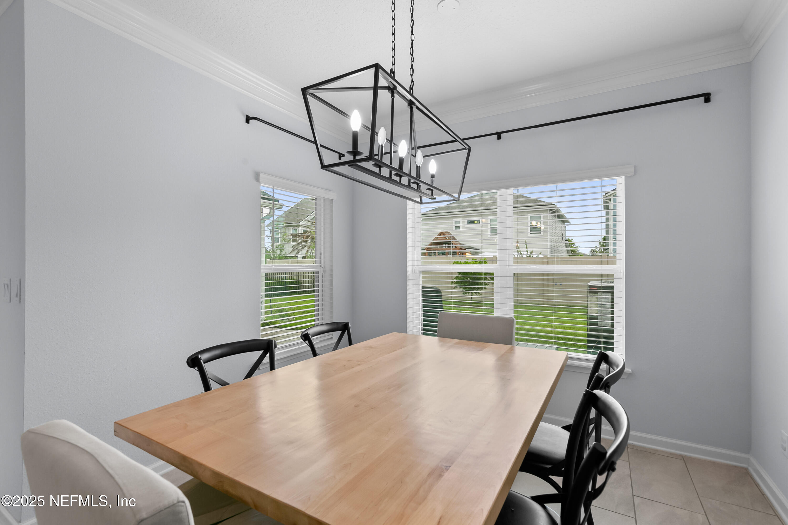 247 Beale Avenue St. Augustine, FL 32092 - Photo 11 of 62 a view of a dining room with furniture and window