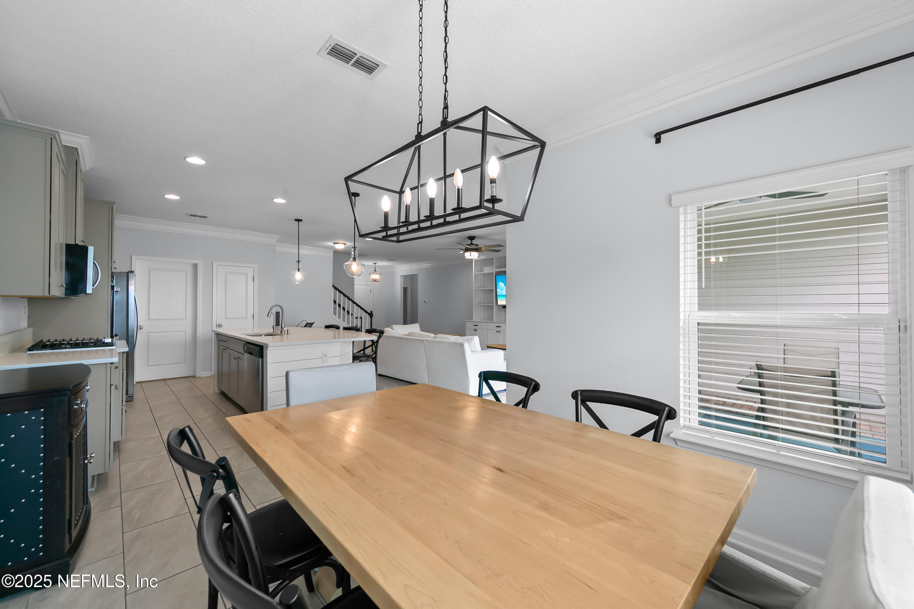 247 Beale Avenue St. Augustine, FL 32092 - Photo 12 of 62 a view of a dining room with furniture