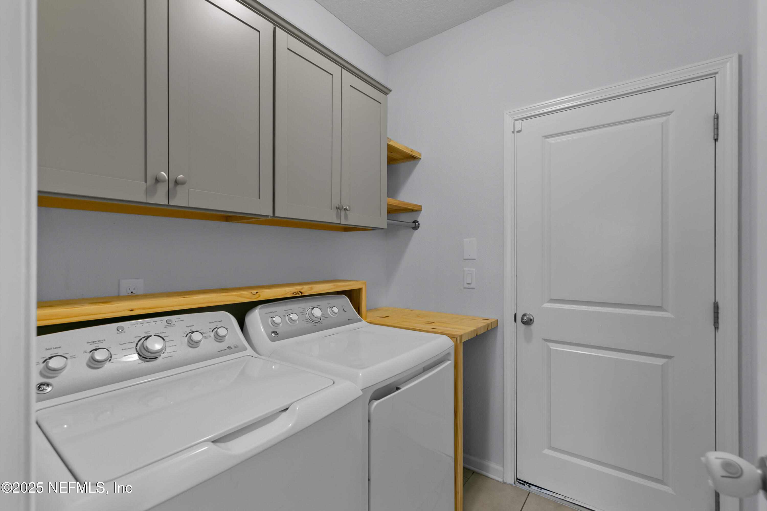 247 Beale Avenue St. Augustine, FL 32092 - Photo 26 of 62 a utility room with dryer and washer