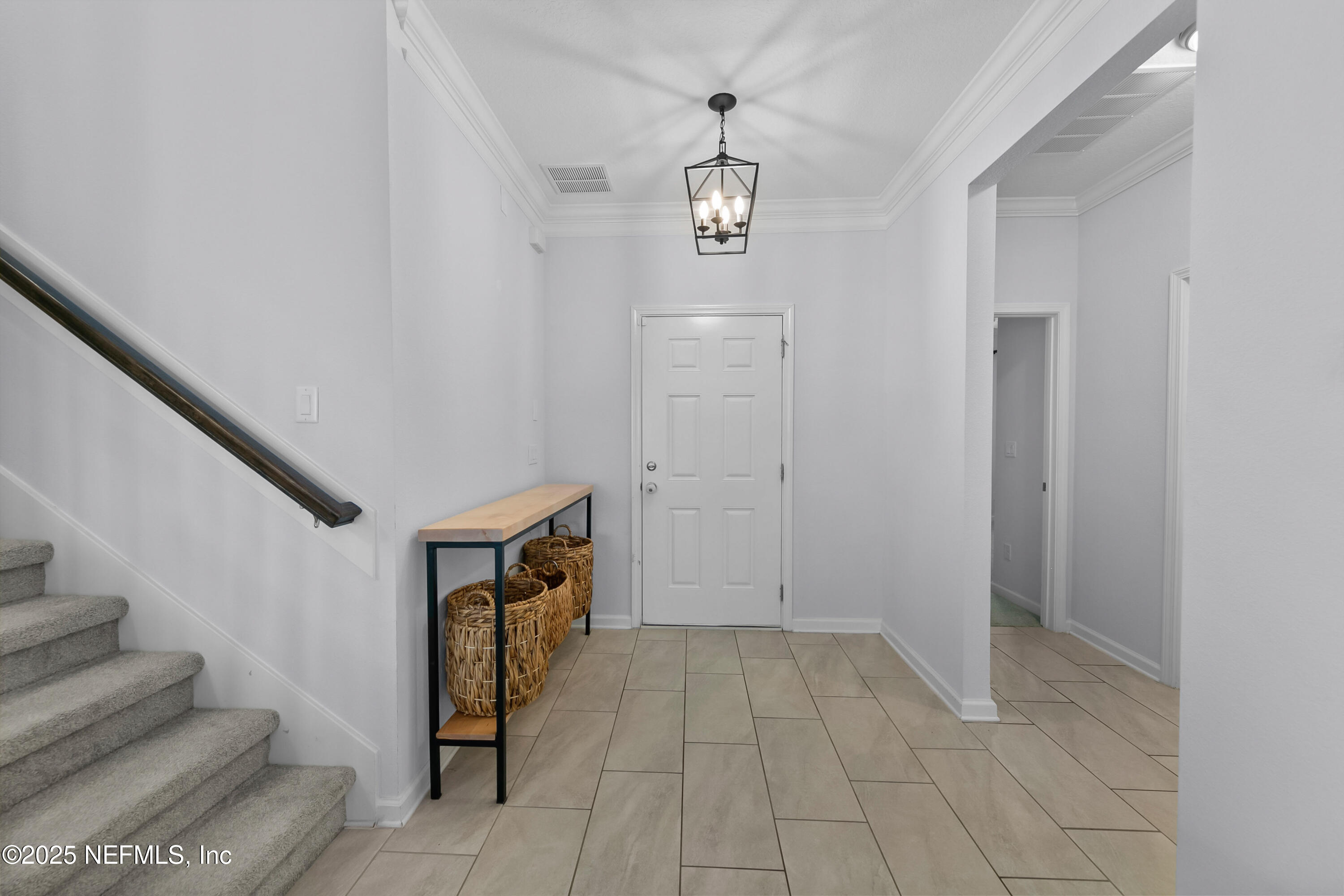 247 Beale Avenue St. Augustine, FL 32092 - Photo 3 of 62 a view of an entryway with stairs