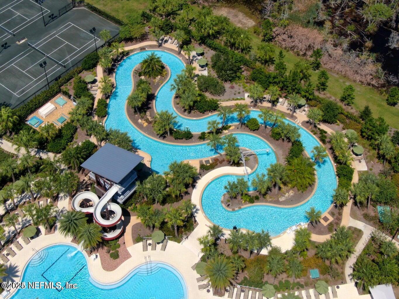 247 Beale Avenue St. Augustine, FL 32092 - Photo 44 of 62 an aerial view of a house with a swimming pool and outdoor seating