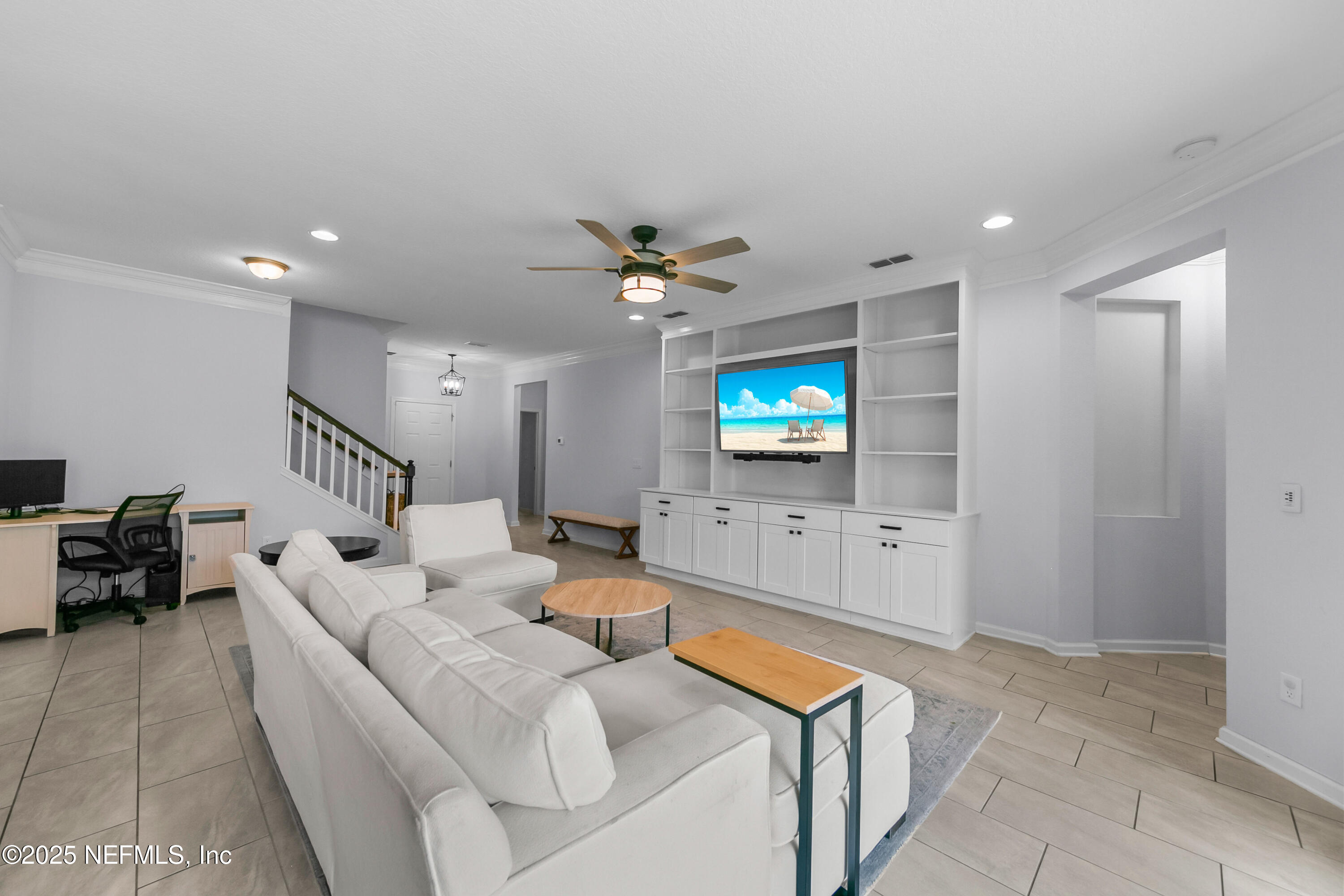 247 Beale Avenue St. Augustine, FL 32092 - Photo 5 of 62 a living room with furniture and a flat screen tv
