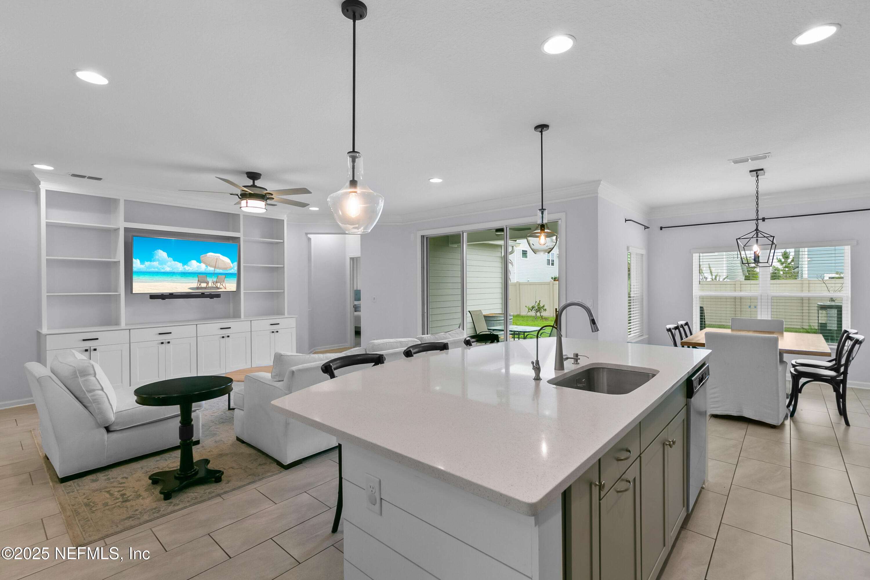 247 Beale Avenue St. Augustine, FL 32092 - Photo 7 of 62 a kitchen with center island table and chairs