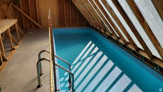 358 South Sky Drive Torrey, UT 84775 - Photo 48 of 82 Indoor swimming pool with concrete decking and stainless steel ladder