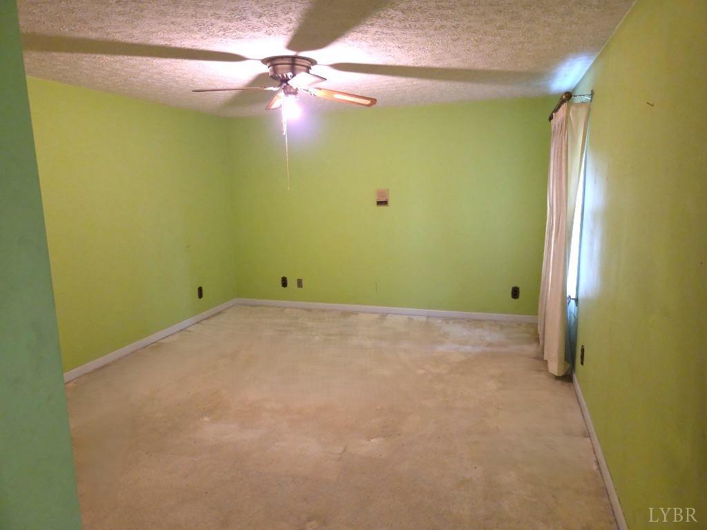 11420 Wards Road Rustburg, VA 24588 - Photo 14 of 34 a view of a room with a empty space