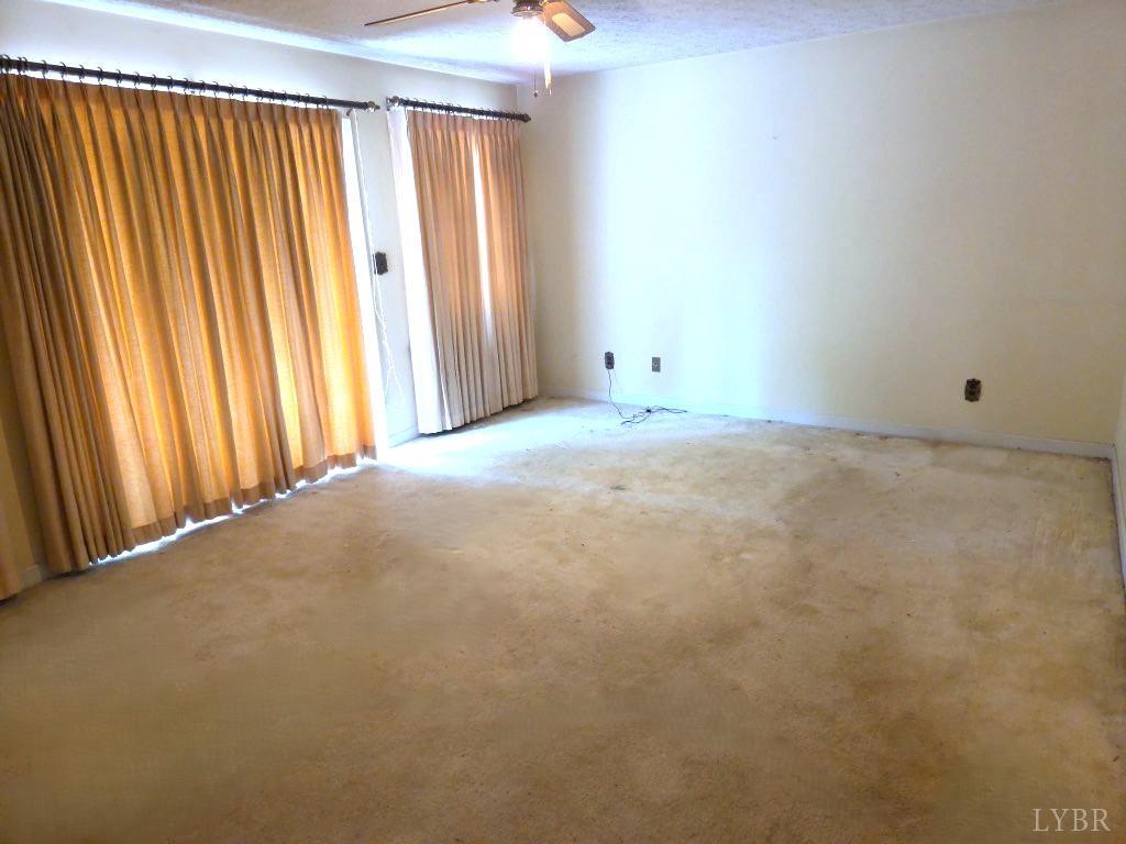 11420 Wards Road Rustburg, VA 24588 - Photo 16 of 34 a view of an empty room with a window