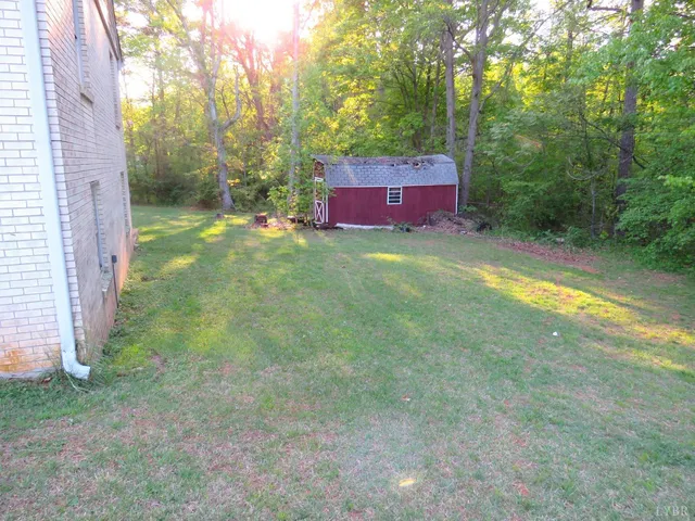 a view of a yard with an outdoor space