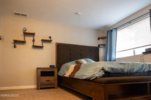 a bathroom with a toilet and a sink