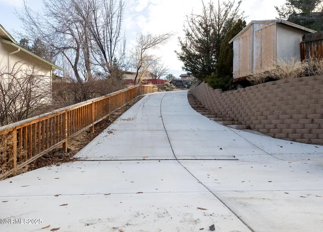 a front view of a building with glass windows and door