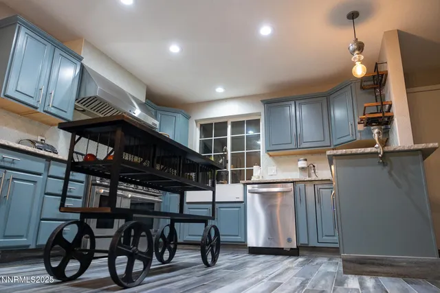 a en suite bathroom with a sink a mirror and a shower