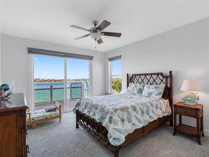 a bedroom with furniture and a couch