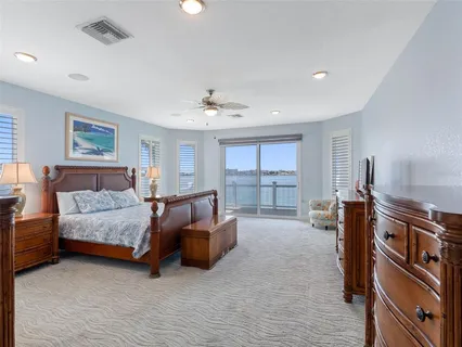 a view of walk in closet with empty room