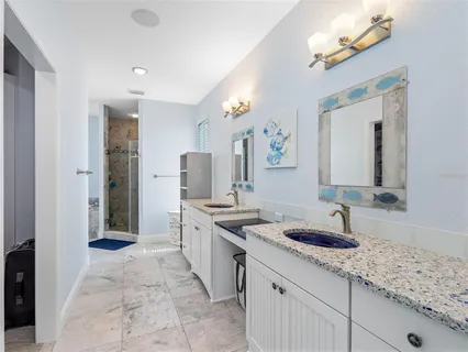 an aerial view of a house with a lake view