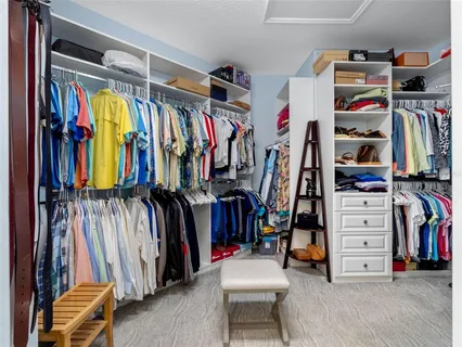 a view of a lake with tall buildings