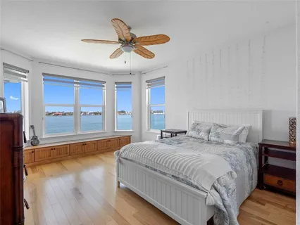 a view of a house with a backyard and a patio