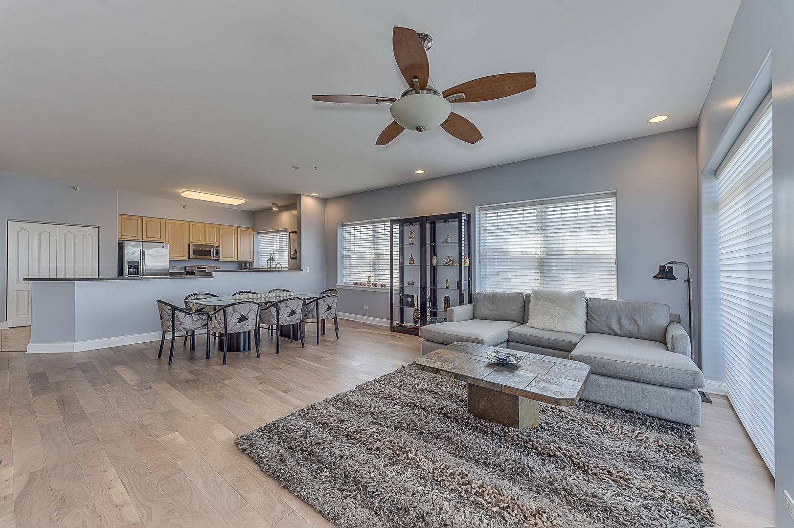 1 Itasca Place, Unit 501 Addison, IL 60143 - Photo 11 of 24 a living room with furniture wooden floor and a table